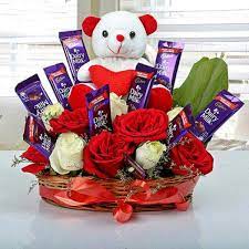 Roses Cadbury and Cute Teddy in Basket